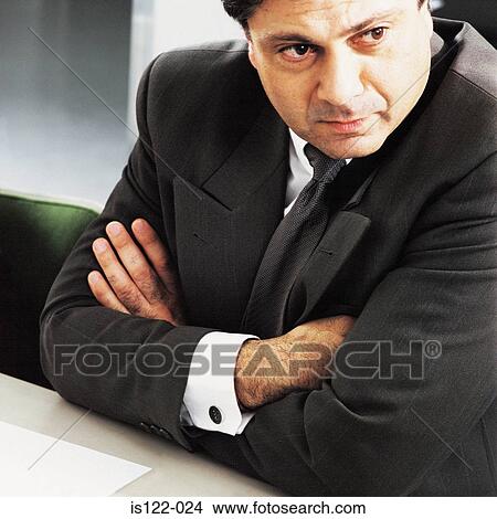 An executive listening to a proposal View Large Photo Image Picture - An executive listening to a proposal . Fotosearch