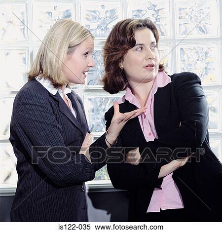 Stock Photography - Gossip at work. Fotosearch