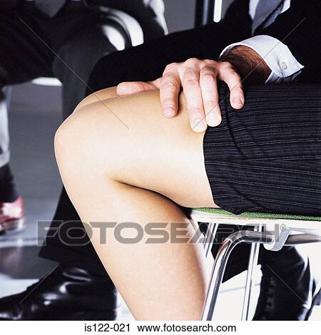 Man touching the legs of a woman View Large Photo Image Stock Image - Man touching the legs of a woman. Fotosearch