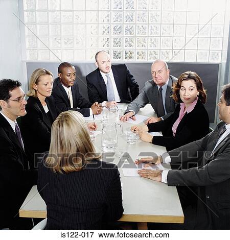 Women and Men at a meeting room View Large Photo Image Stock Photo - Women and Men at a meeting room. Fotosearch