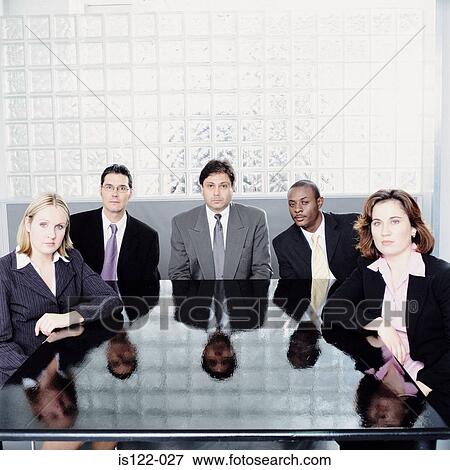 Women and men at a meeting room View Large Photo Image Stock Photo - Women and men at a meeting room. Fotosearch