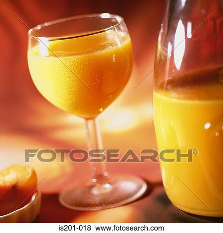 Peach juice View Large Photo Image Stock Photo - Peach juice. Fotosearch