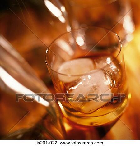 Whisky on the rocks View Large Photo Image Stock Image - Whisky on the rocks. Fotosearch