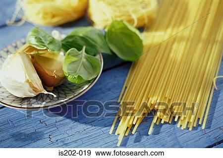 Pasta and herbs View Large Photo Image Stock Photo - Pasta and herbs. Fotosearch