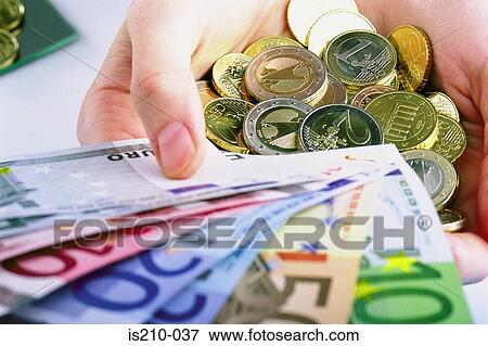 Euro notes and coins View Large Photo Image Stock Photo - Euro notes and coins. Fotosearch