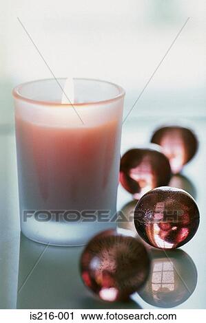 Candle with bath pearls View Large Photo Image Stock Image - Candle with bath pearls. Fotosearch