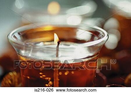 Stock Photograph - Coloured candle. Fotosearch