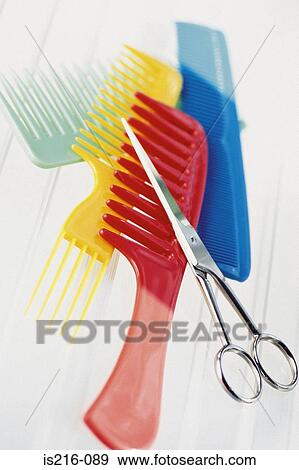 Stock Photo - Combs and scissors. Fotosearch