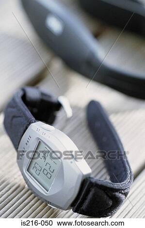 Stock Image - Digital wristwatch. Fotosearch