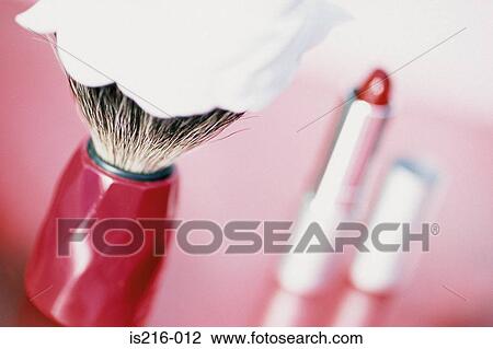 Stock Image - Lipstick and shaving brush. Fotosearch
