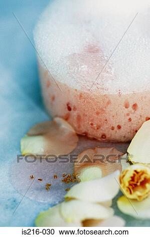 Stock Image - Rose petals and sponge. Fotosearch