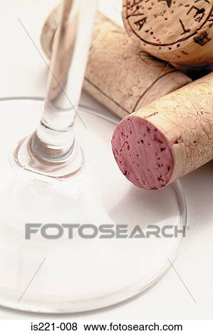 Corks and wine glass View Large Photo Image Stock Photo - Corks and wine glass. Fotosearch