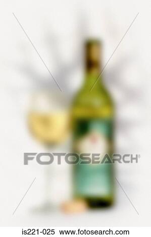Stock Photography - Glass of white wine and bottle. Fotosearch