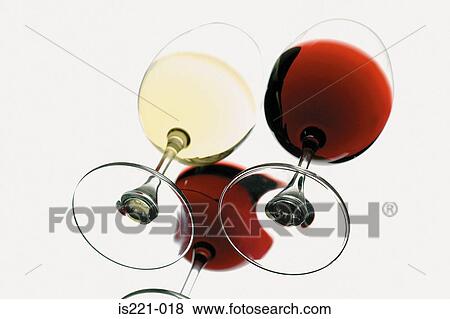 Glasses of red and white wine View Large Photo Image Stock Photo - Glasses of red and white wine. Fotosearch