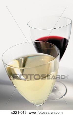 Glasses of red and white wine View Large Photo Image Stock Photograph - Glasses of red and white wine. Fotosearch