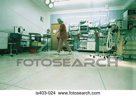 Picture - Nurse cleaning operating theatre. Fotosearch