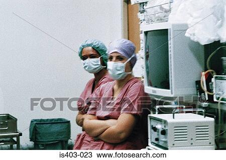 Stock Image - Surgical nurses. Fotosearch