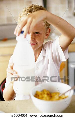 Picture - Boy having breakfast. Fotosearch