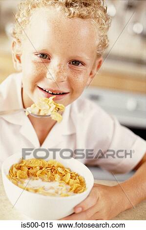Stock Photography - Boy having breakfast. Fotosearch
