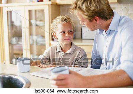 Father and son having a drink View Large Photo Image Picture - Father and son having a drink. Fotosearch