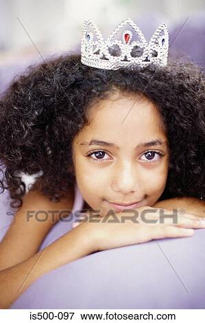 Girl lying on sofa View Large Photo Image Stock Photo - Girl lying on sofa. Fotosearch