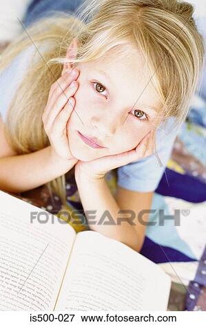 Stock Photo - Girl reading. Fotosearch