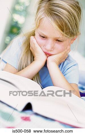 Stock Photo - Girl reading. Fotosearch
