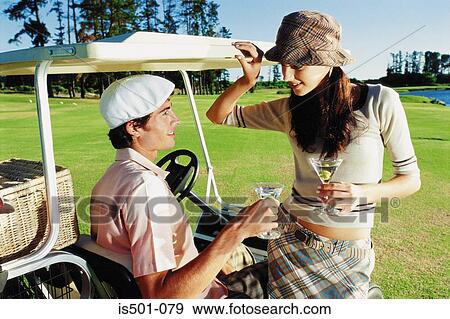 Couple at the golf club View Large Photo Image Stock Photo - Couple at the golf club. Fotosearch
