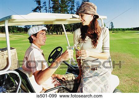 Stock Photo - Couple at the golf club. Fotosearch