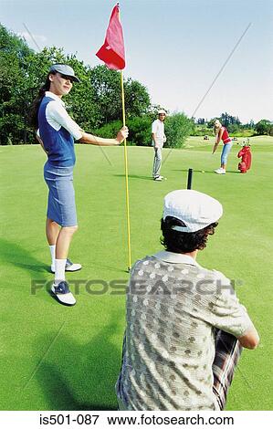 Friends at the golf course View Large Photo Image Stock Photo - Friends at the golf course. Fotosearch