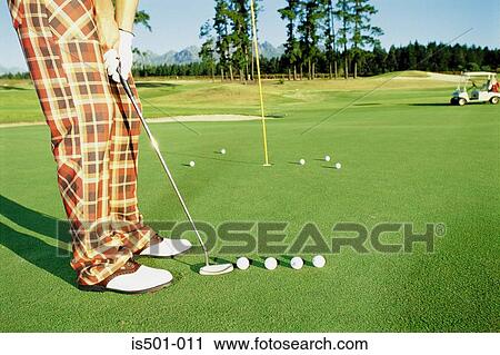 Man playing golf View Large Photo Image Stock Image - Man playing golf. Fotosearch