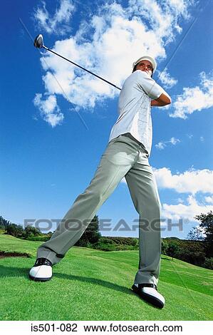 Man playing golf View Large Photo Image Stock Image - Man playing golf. Fotosearch