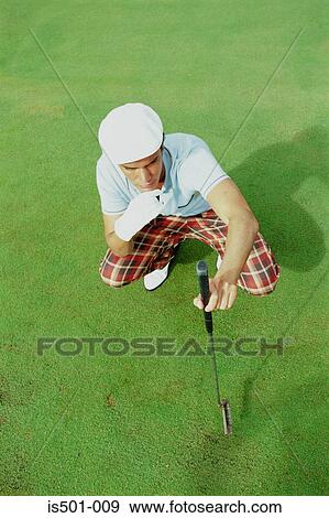Man playing golf View Large Photo Image Stock Photo - Man playing golf. Fotosearch