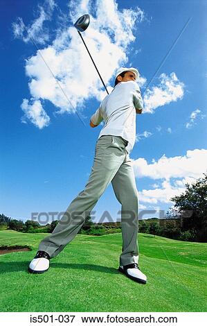 Man playing golf View Large Photo Image Stock Photo - Man playing golf. Fotosearch
