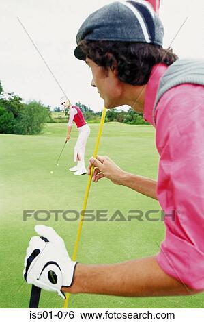 Stock Photograph - Man playing golf. Fotosearch