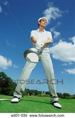 Stock Photography - Man playing golf. Fotosearch
