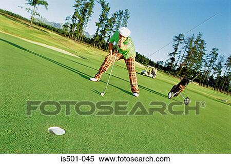Man playing golf View Large Photo Image Stock Photography - Man playing golf. Fotosearch