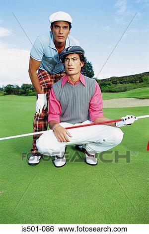 Stock Photograph - Men playing golf. Fotosearch
