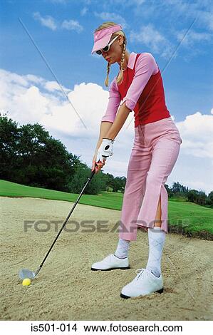 Woman playing golf View Large Photo Image Picture - Woman playing golf. Fotosearch