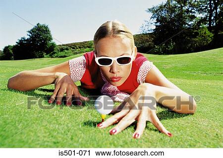 Woman playing golf View Large Photo Image Stock Image - Woman playing golf. Fotosearch