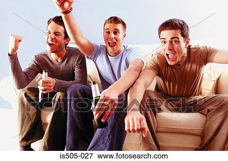 Stock Photo - Men having a drink. Fotosearch