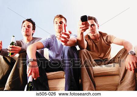 Men having a drink View Large Photo Image Stock Photograph - Men having a drink. Fotosearch