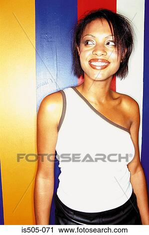 Stock Image - Portrait of a woman in nightclub. Fotosearch