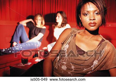 Stock Photo - Portrait of a women in nightclub. Fotosearch