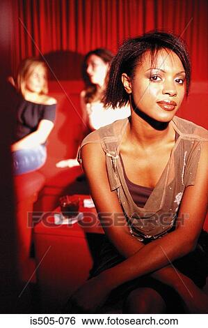 Portrait of a women in nightclub View Large Photo Image Stock Photograph - Portrait of a women in nightclub. Fotosearch