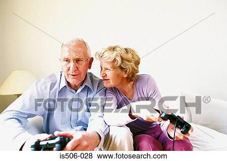 Man and woman playing computer game View Large Photo Image Stock Photo - Man and woman playing computer game. Fotosearch