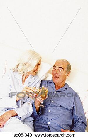 Man and woman proposing toast View Large Photo Image Stock Image - Man and woman proposing toast. Fotosearch