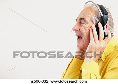 Man listening to music View Large Photo Image Stock Image - Man listening to music. Fotosearch