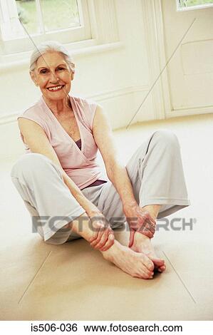 Stock Photograph - Woman doing yoga. Fotosearch