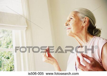 Woman doing yoga View Large Photo Image Stock Photography - Woman doing yoga. Fotosearch